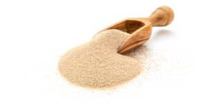 Dry-yeast-in-wooden-scoop-scaled.jpg